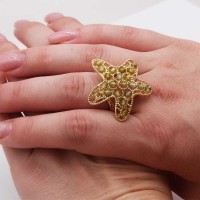 Anello regolabile oro stella marina grande con cristalli verdi