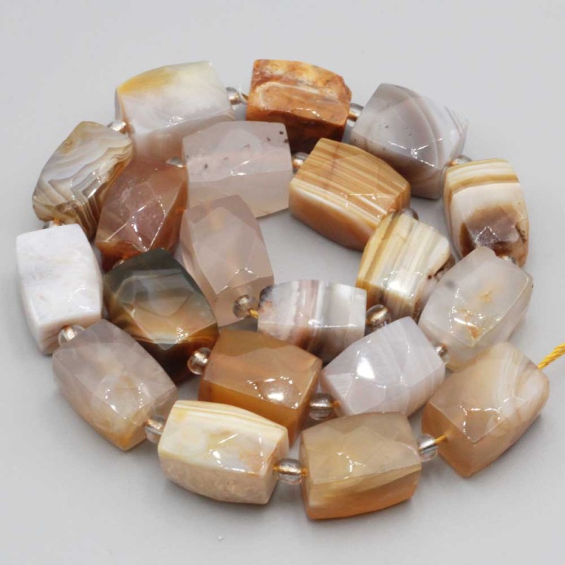 Agata striata marrone colonna 16x11 mm sfac. conf. 2 pz (col-ama20) - pietreeminuterie.com