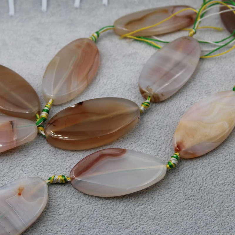 Agata striata marrone e bianca 50x25 mm liscia 1 pz (stri-m1-m1) - pietreeminuterie.com