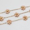Catena acciaio oro con fiore cristalli cream A/B 10 mm conf. 50 cm (fio-1828) - pietreeminuterie.com