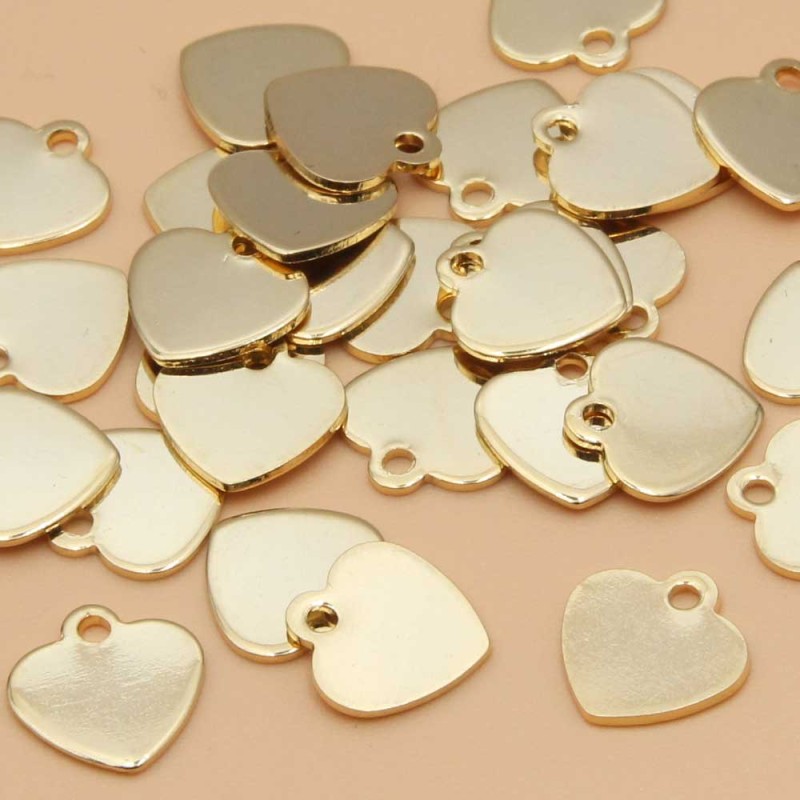 Charms acciaio oro cuore 13 mm 5 pz (he5oro39) - pietreeminuterie.com
