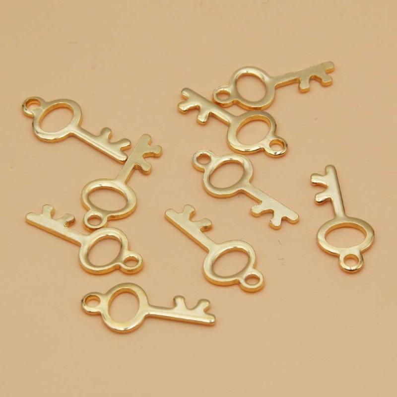 Charms acciaio oro chiave 15.5 mm 5 pz (chiav59aa) - pietreeminuterie.com