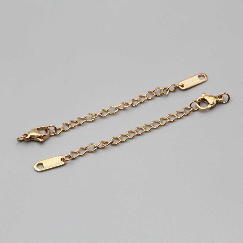 Prolungamento in acciaio oro catena con chiusura e bollatina ovale tonda 2 pz - prol-0c77 - pietreeminuterie.com Prolungamento in acciaio oro catena con chiusura e bollatina ovale tonda 2 pz (prol-0c77) - pietreeminuterie.com