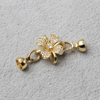 Chiusura in ottone placcata oro con strass fiore 40 mm 1 pz Chiusura in ottone placcata oro con strass fiore 40 mm 1 pz