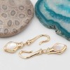 Chiusura ad amo con pietre dure occhi di gatto bianco oro 37 mm con strass conf. 1 pz - chiu-9023 - pietreeminuterie.com Chiusura ad amo con pietre dure occhi di gatto bianco oro 37 mm con strass conf. 1 pz (chiu-9023) - pietreeminuterie.com