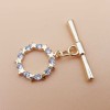 Chiusura a T Bar oro tonda con strass e stelle 13.2 mm 1 pz (tbarst330) - pietreeminuterie.com