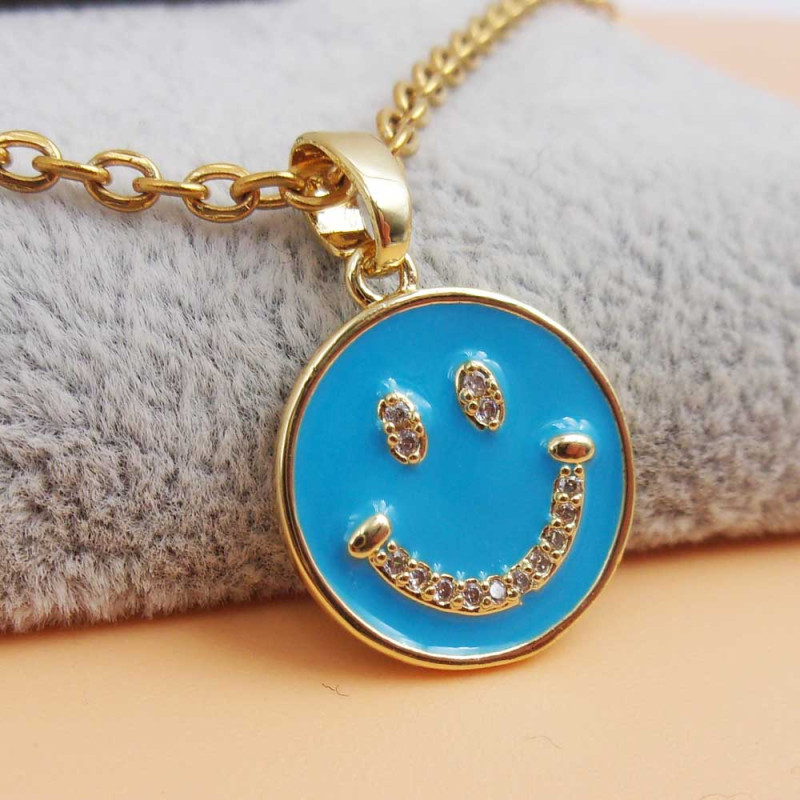 Ciondolo oro smaltato azzurro smile con strass 15 mm 1 pz (smiros40) - pietreeminuterie.com