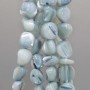 Conchiglie naturali pepite 6/8 mm grigie filo 40 cm
