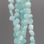 Conchiglie naturali pepite 6/8 mm turchese chiaro filo 40 cm