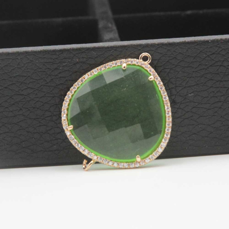 Connettore cristallo verde con strass 33x28 mm1 pz (conn-ver111) - pietreeminuterie.com