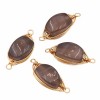 Connettori agata grigia filo oro intrecciato 22x8 mm conf. 1 pz Connettori agata grigia filo oro intrecciato 22x8 mm conf. 1 pz