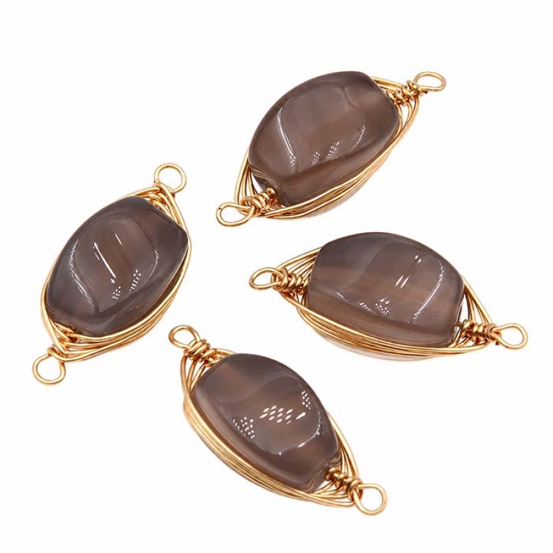 Connettori agata grigia filo oro intrecciato 22x8 mm conf. 1 pz Connettori agata grigia filo oro intrecciato 22x8 mm conf. 1 pz