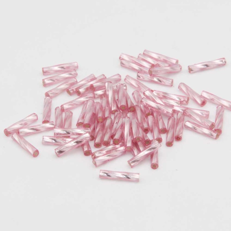 Perline vetro tubicino rosa 7x2 mm conf. 5 GR (circa 150 pz) Perline vetro tubicino rosa 7x2 mm conf. 5 GR (circa 150 pz)
