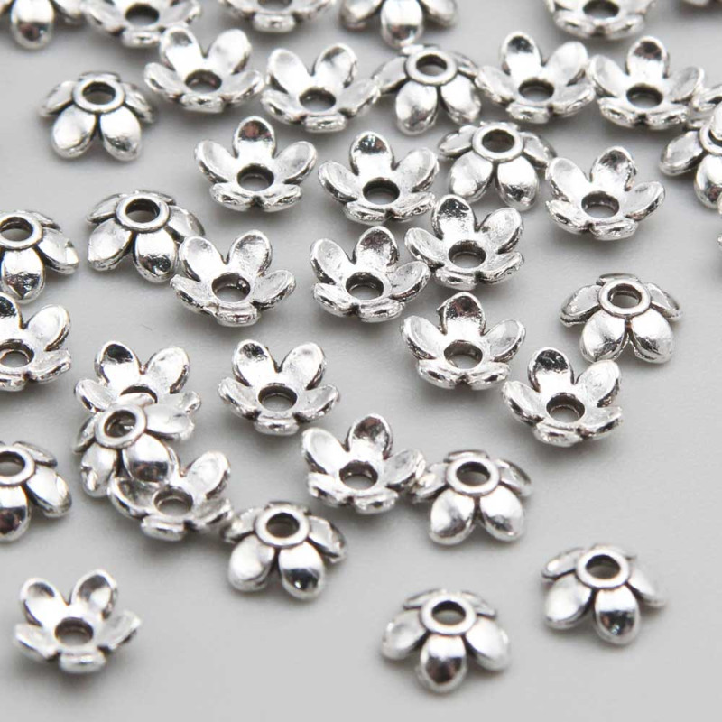 Coppette fiore argento 6 mm pacco 50 pz (6mm6fior) - pietreeminuterie.com