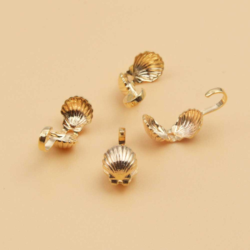 Copri nodo conchiglia gold plated 14kt 5 mm 10 pz (ccodo141q) - pietreeminuterie.com