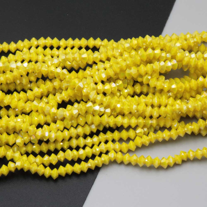 Cristalli bicono 4x3 mm gialli a/b filo 40 cm (bic-4x31) - pietreeminuterie.com