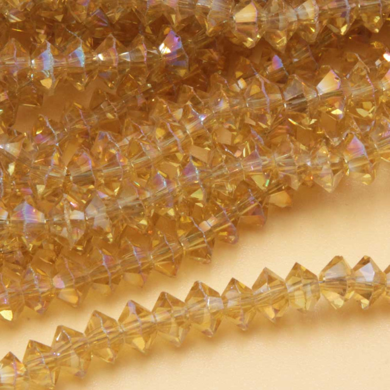 Cristalli bicono 6 mm gold a/b filo 40 cm (bic-t663) - pietreeminuterie.com