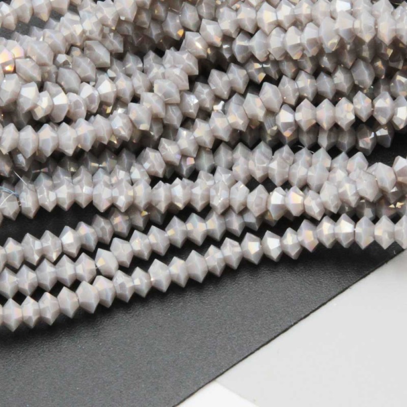 Cristalli bicono 4x3 mm grey a/b filo 40 cm (bic-4x6s) - pietreeminuterie.com