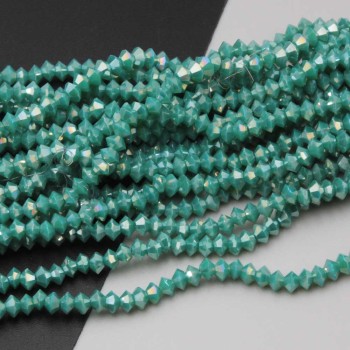 Cristalli bicono 4x3 mm turchese a/b filo 40 cm
