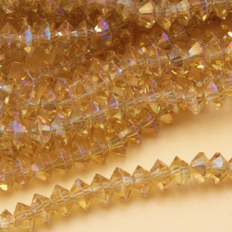 Cristalli bicono 6 mm gold a/b filo 40 cm (bic-t663) - pietreeminuterie.com