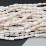 Cristalli rettangolari 9x6 mm crema a/b grado A++ filo 30 cm 34 pz circa