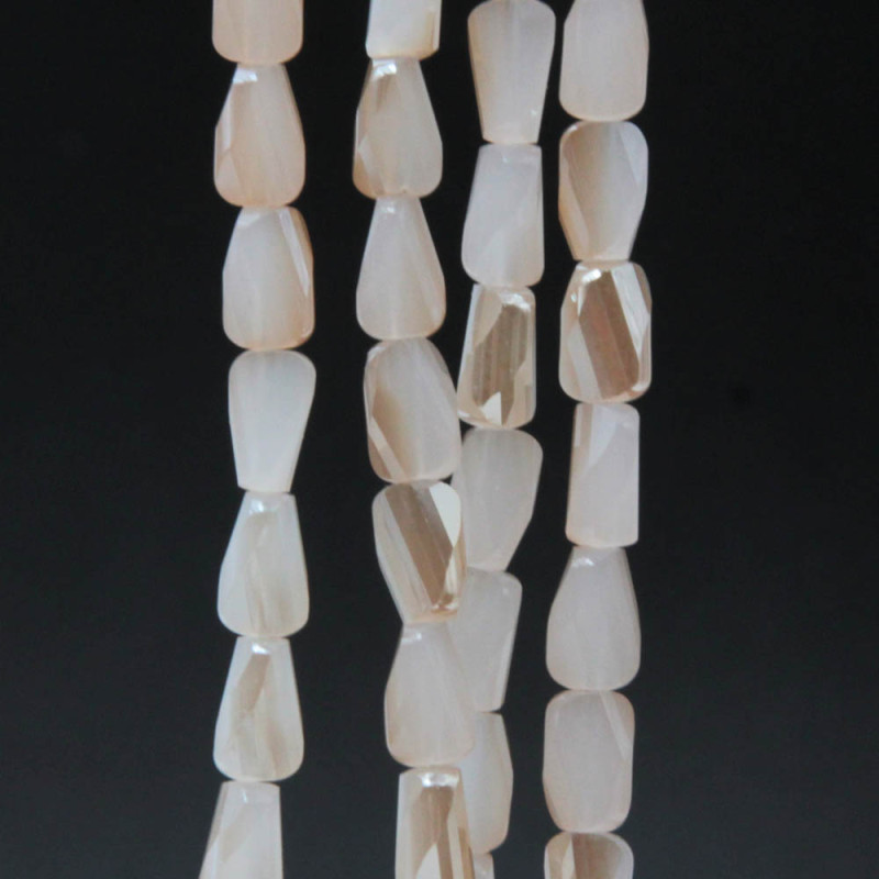 Cristalli rettangolo twister crema A/B 6.5x4 mm filo 55 cm (cre-o200) - pietreeminuterie.com