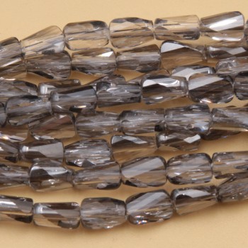 Cristalli rettangolo twister grey 6.5x4 mm filo 55 cm Cristalli rettangolo twister grey 6.5x4 mm filo 55 cm