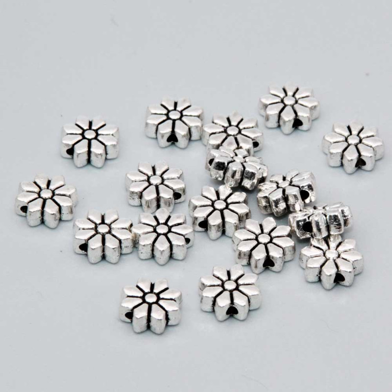Distanziatore fiore 8.5 mm conf. 30 pz (fio-90022) - pietreeminuterie.com