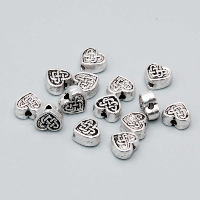 Distanziatori in zama cuore decorato 6 mm conf. 50 pz (6m-deche) - pietreeminuterie.com