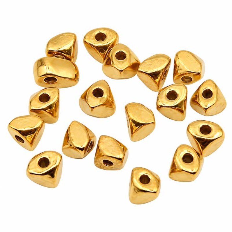 Pepite acciaio oro 5x4 mm foro 1.5 mm circa 20 pz Pepite acciaio oro 5x4 mm foro 1.5 mm circa 20 pz