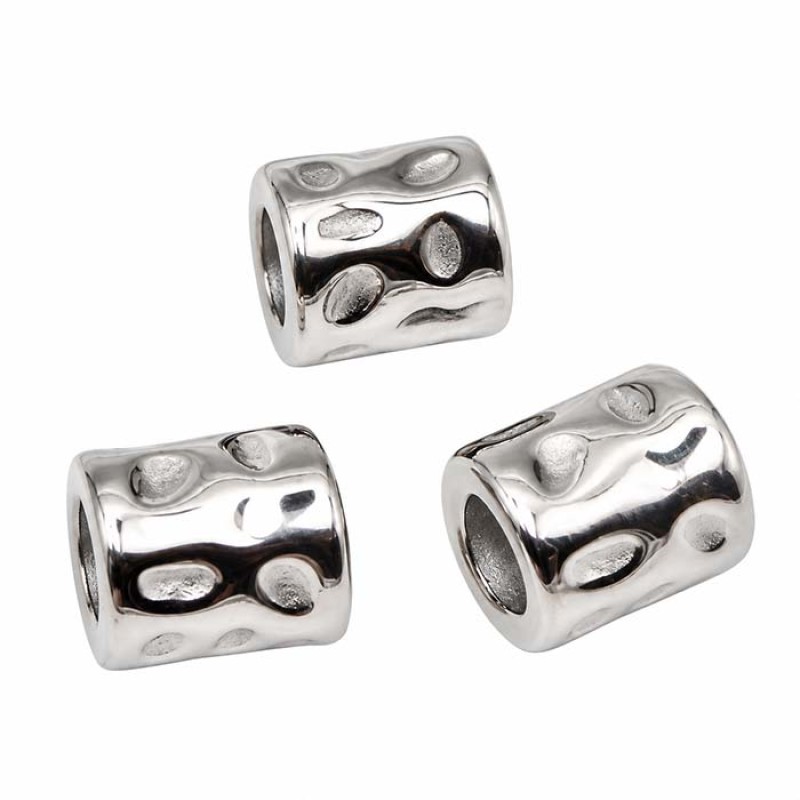 Tubicino decorato acciaio 6.5x6 mm foro 4 mm conf. 5 pz Tubicino decorato acciaio 6.5x6 mm foro 4 mm conf. 5 pz