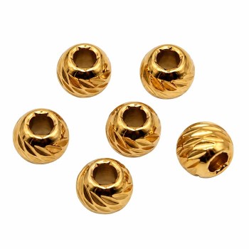 Pallina intagliata in acciaio oro 5x4 mm foro 3 mm circa conf. 10pz Pallina intagliata in acciaio oro 5x4 mm foro 3 mm circa conf. 10pz