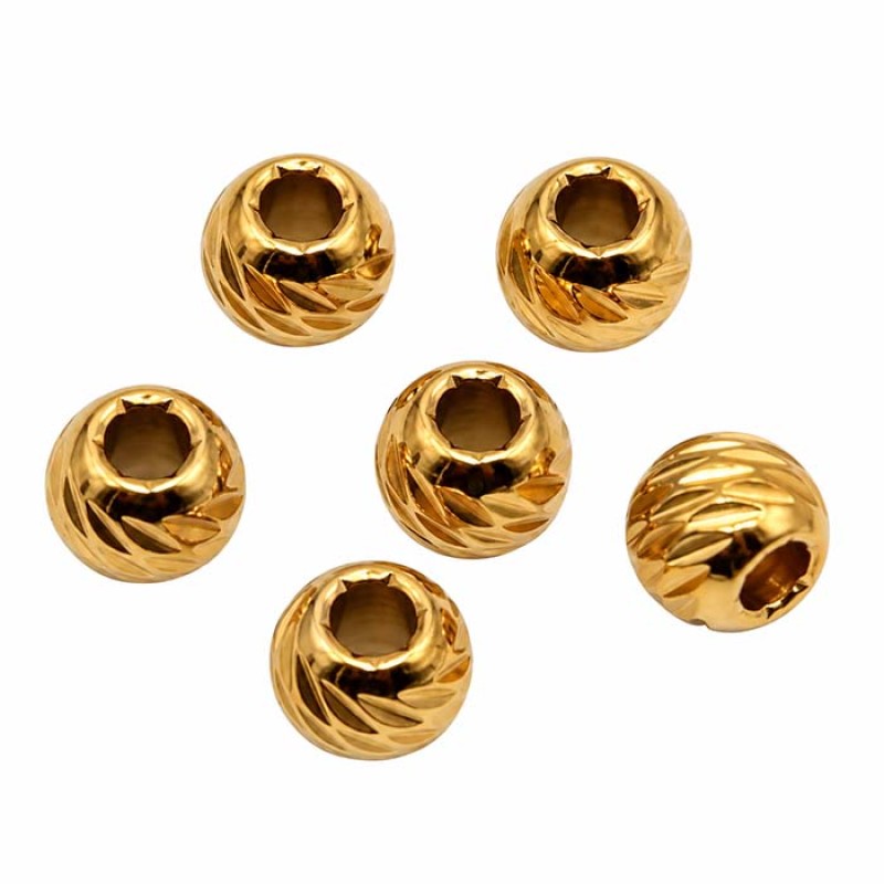 Pallina intagliata in acciaio oro 5x4 mm foro 3 mm circa conf. 10pz Pallina intagliata in acciaio oro 5x4 mm foro 3 mm circa conf. 10pz