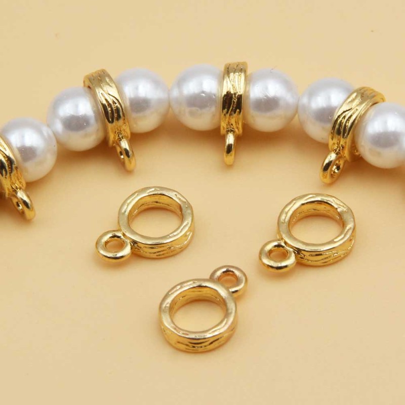 Anellino con asolo gold plated 7 mm 5 pz - ane-11-fa-2 - pietreeminuterie.com Anellino con asolo gold plated 7 mm 5 pz (ane-11-fa-2) - pietreeminuterie.com
