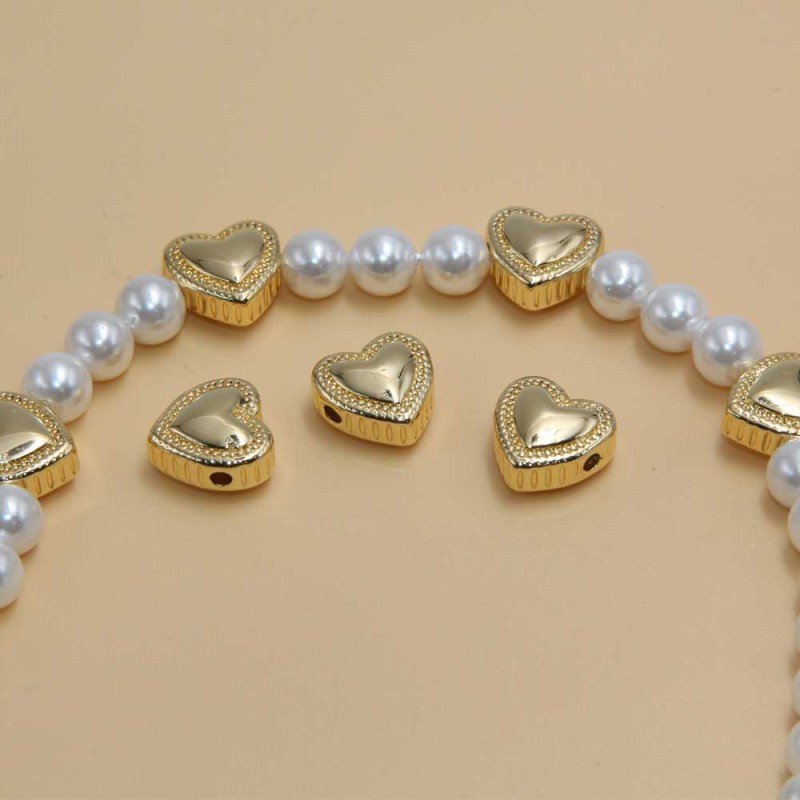 Distanziatori gold plated cuore 10 mm 2 pz - plated-04 - pietreeminuterie.com Distanziatori gold plated cuore 10 mm 2 pz (plated-04) - pietreeminuterie.com