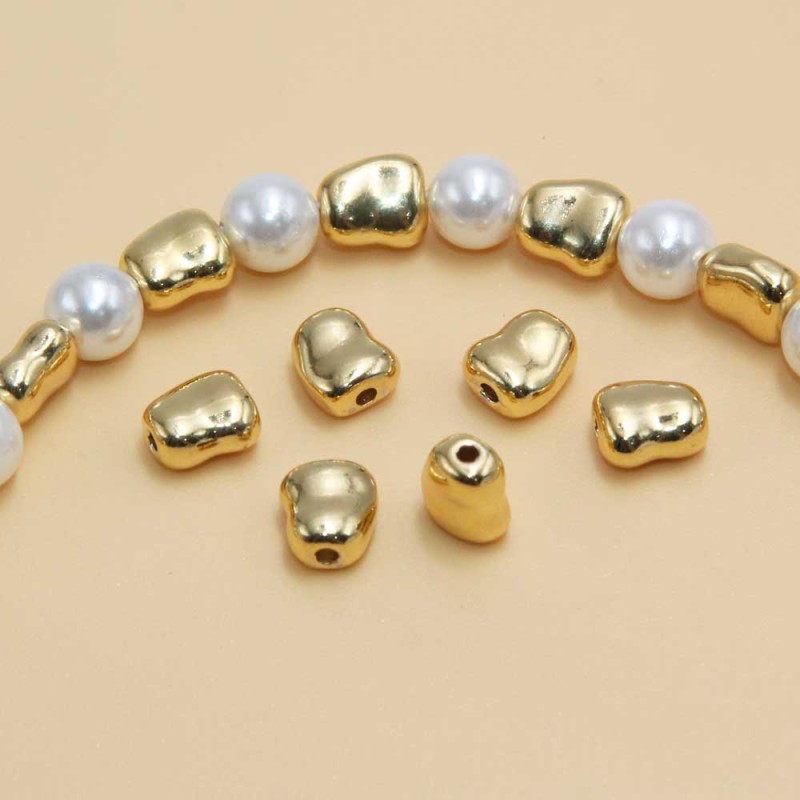 Distanziatori gold plated pepite 7x6 mm 10 pz - plated-07 - pietreeminuterie.com Distanziatori gold plated pepite 7x6 mm 10 pz (plated-07) - pietreeminuterie.com