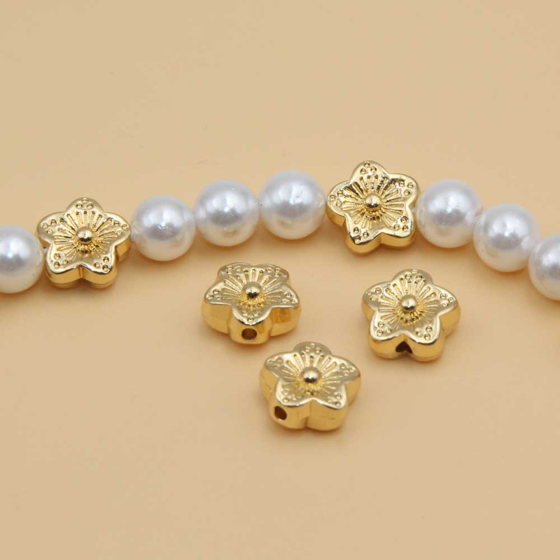 Distanziatore gold plated fiore 8 mm 10 pz (fio-e-3311) - pietreeminuterie.com