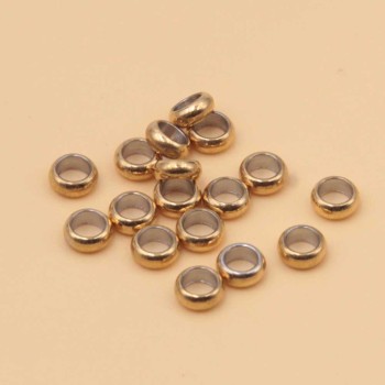 Distanziatori rondelle oro 5.7x1.8 mm foro 4 mm 10 pz Distanziatori rondelle oro 5.7x1.8 mm foro 4 mm 10 pz