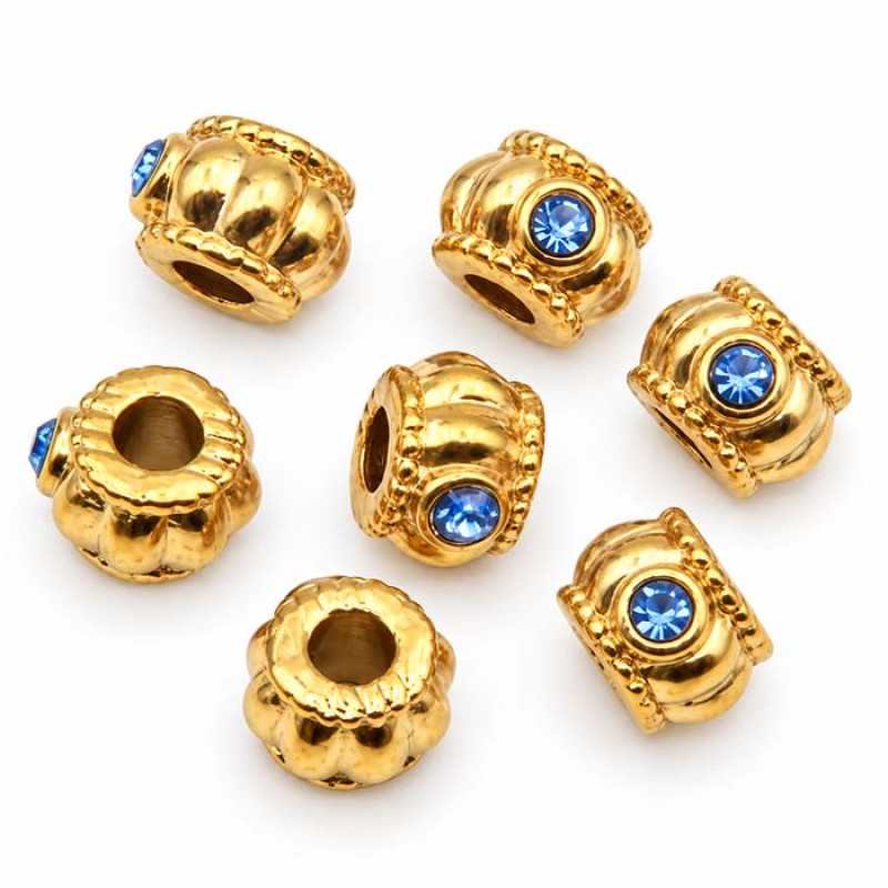 Distanziatori in acciaio oro con strass azzurro 6x4 mm foro 3 mm 1 pz Distanziatori in acciaio oro con strass azzurro 6x4 mm foro 3 mm 1 pz