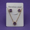 Set collana e orecchini acciaio oro quadrifoglio viola Set collana e orecchini acciaio oro quadrifoglio viola
