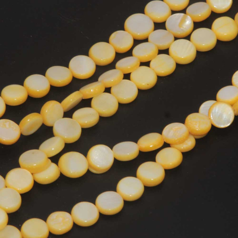 Madreperla gettone giallo 7 mm filo 40 cm (Madr-r912) - pietreeminuterie.com