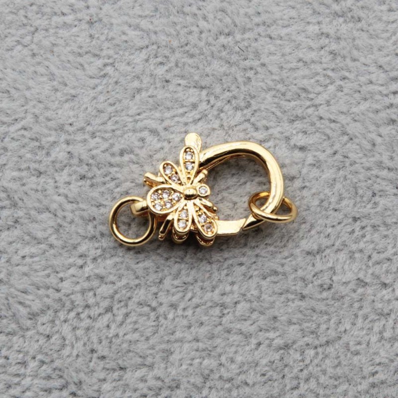 Moschettone ottone placcato oro 18 mm farfalla 1 pz - mo-10-cz1 - pietreeminuterie.com Moschettone ottone placcato oro 18 mm farfalla 1 pz (mo-10-cz1) - pietreeminuterie.com