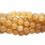 Occhi di gatto tondo liscio senape 6 mm filo 40 cm