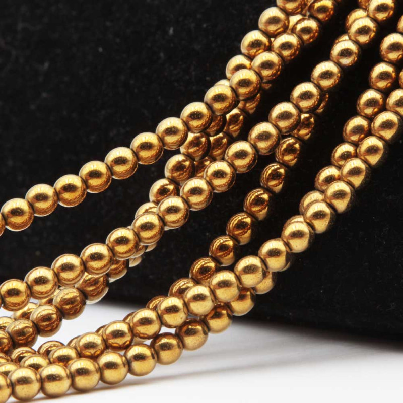 Ematite tonda liscia oro 4 mm filo 40 cm (gol-em33) - pietreeminuterie.com