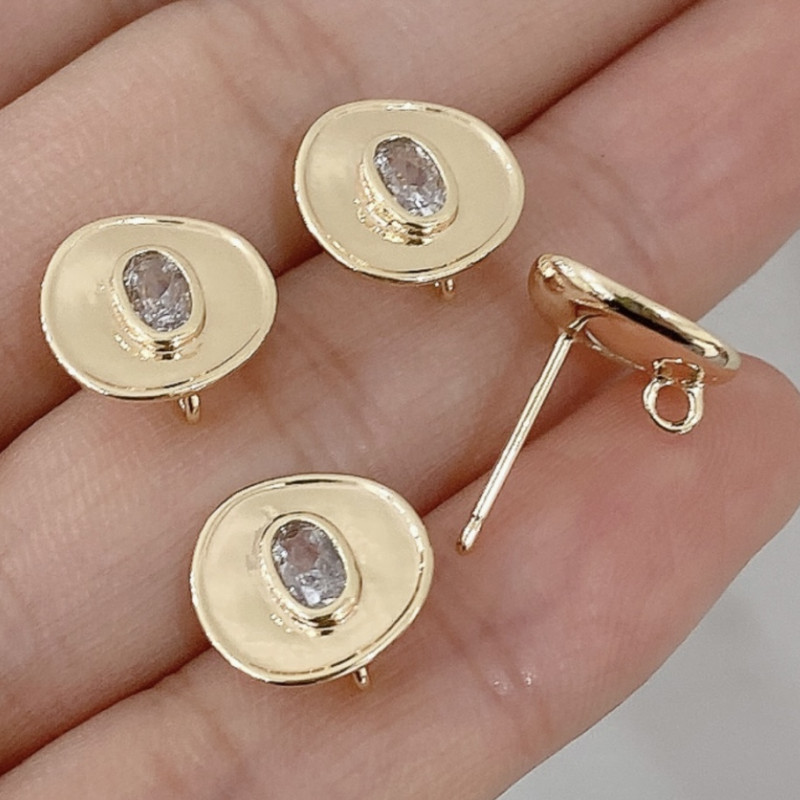 Orecchini a perno tondo strass centrale ovale placcato oro 14 kt 10 mm 2 pz (ss43a55a) - pietreeminuterie.com