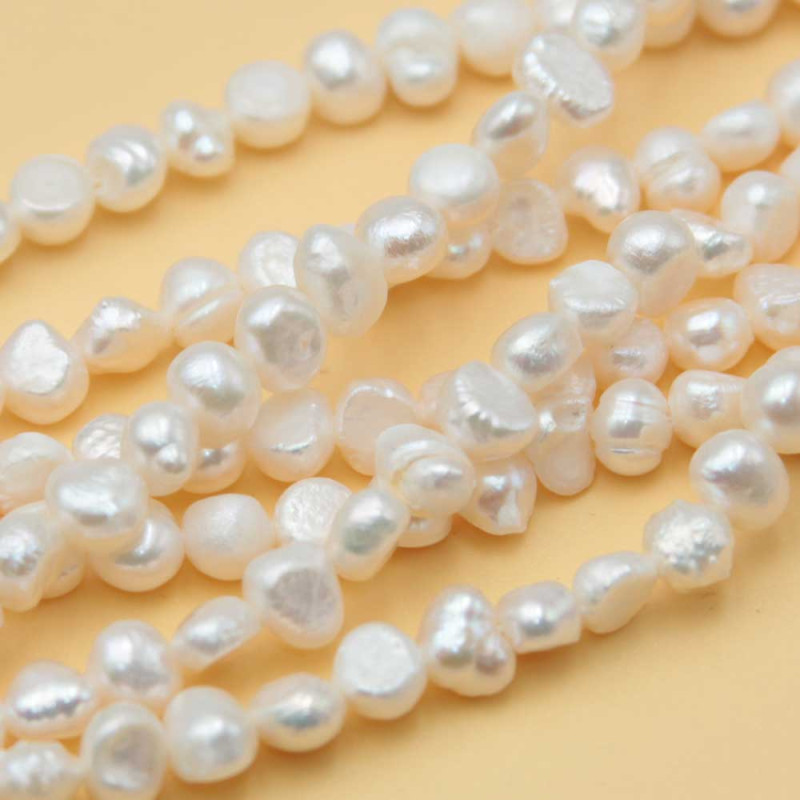 Perle di fiume bianche 6 mm irregolari AAAA Quality filo 35 cm (6-mm-perle) - pietreeminuterie.com