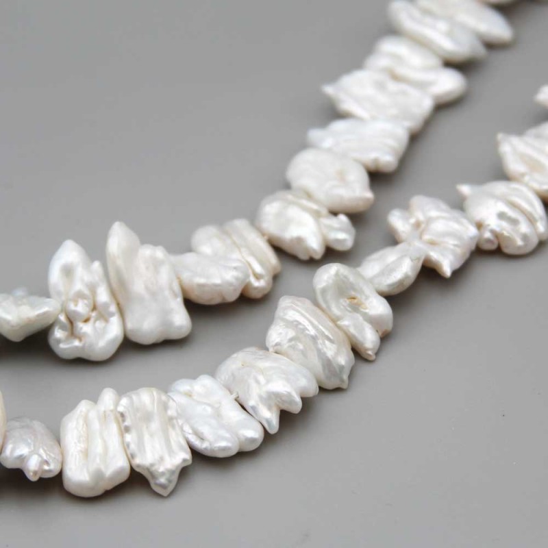 Perle di fiume irregolari bianche multiriflesso 15x9 mm circa grado A+++ 2 pz (82777-pl) - pietreeminuterie.com