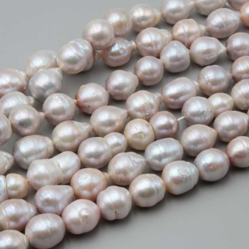 Perle di fiume riflessi rosa/champagne 12/16 mm conf. 10 pz - per-1214m - pietreeminuterie.com Perle di fiume riflessi rosa/champagne 12/16 mm conf. 10 pz (per-1214m) - pietreeminuterie.com