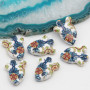 Perline in ceramica cactus bianco fiori azzurri 17x13 mm conf. 2 pz