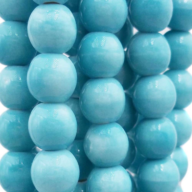 Perline in ceramica turchese 6x5.4 mm filo 32 cm (6112055) - pietreeminuterie.com